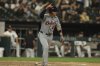 Detroit Tigers' Spencer Torkelson celebrates after hitting a home run during the ninth inning of a baseball game against the Chicago White Sox, Monday, Aug. 11, 2025, in Chicago. (AP Photo/Melissa Tamez)