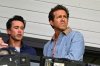 Wrexham co-owners Rob McElhenney, left, and Ryan Reynolds in the stands ahead of the Sky Bet Championship match between AFC Wrexham and West Bromwich Albion in Wrexham, England, Saturday Aug. 16, 2025. (Cody Froggatt/PA via AP)