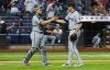 Miami Marlins catcher Agustín Ramírez (50) and pitcher Tyler Phillips celebrate after defeating the New York Mets, Saturday, Aug. 30, 2025, in New York. (AP Photo/Noah K. Murray)