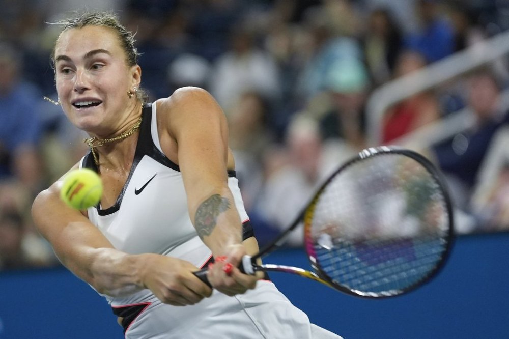 Aryna Sabalenka, of Belarus, returns a shot to Cristina Bucsa, of Spain, during the fourth round of the US Open tennis championships, Sunday, Aug. 31, 2025, in New York. (AP Photo/Pamela Smith)