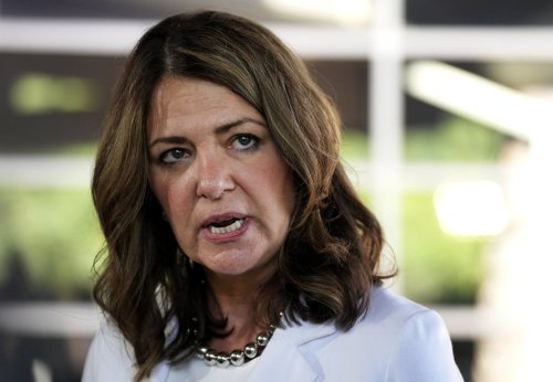 Alberta Premier Danielle Smith speaks to the media during the meeting of Canada’s premiers at Deerhurst Resort in Huntsville, Ont., on Monday, July 21, 2025. THE CANADIAN PRESS/Nathan Denette