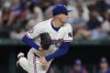 Texas Rangers starting pitcher Patrick Corbin follows through on his delivery to the Los Angeles Angels in the seventh inning of a baseball game, Tuesday, Aug. 26, 2025, in Arlington, Texas. (AP Photo/Tony Gutierrez)