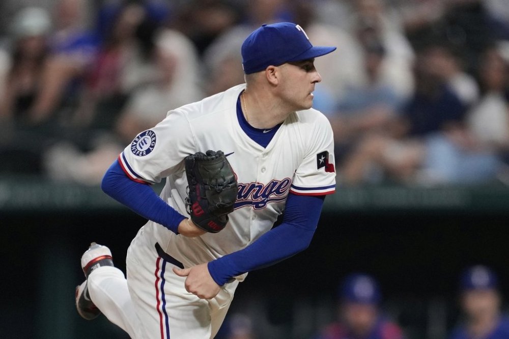 Texas Rangers starting pitcher Patrick Corbin follows through on his delivery to the Los Angeles Angels in the seventh inning of a baseball game, Tuesday, Aug. 26, 2025, in Arlington, Texas. (AP Photo/Tony Gutierrez)
