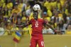 Canada's Tani Oluwaseyi jumps for a header during an international friendly soccer match between Romania and Canada at the National Arena stadium in Bucharest, Romania, Friday, Sept. 5, 2025. (AP Photo/Andreea Alexandru)