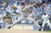 San Francisco Giants' Logan Webb pitches during the first inning of a baseball game against the Milwaukee Brewers, Saturday, Aug. 23, 2025, in Milwaukee. (AP Photo/Aaron Gash)