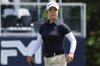 Sei Young Kim, of South Korea, crosses the 18th green after putting out during the first round of the FM Championship LPGA golf tournament at TPC Boston, Thursday, Aug. 28, 2025, in Norton, Mass. (AP Photo/Michael Dwyer)