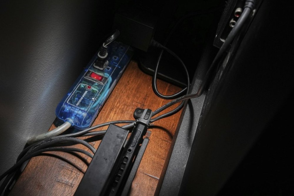 Electronics are plugged in at a home Tuesday, Sept. 2, 2025, in Cincinnati. (AP Photo/Joshua A. Bickel)