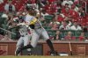 Pittsburgh Pirates' Tommy Pham hits a two-run single during the sixth inning of a baseball game against the St. Louis Cardinals Wednesday, Aug. 27, 2025, in St. Louis. (AP Photo/Jeff Roberson)