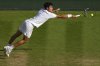 FILE - Carlos Alcaraz, of Spain, returns to Italy's Jannik Sinner in the men's singles final at the Wimbledon Tennis Championships in London, July 13, 2025. (AP Photo/Joanna Chan, File)