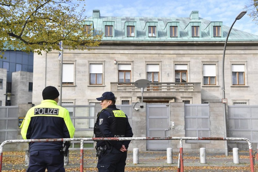 Police officers stand by the Israeli embassy in Berlin, Sunday, Oct. 20, 2024. (Paul Zinken/dpa via AP, File)