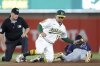 Tampa Bay Rays' Chandler Simpson, right, avoids the tag by Athletics second baseman Luis Urías to steal second base during the fourth inning of a baseball game Monday, Aug. 11, 2025, in West Sacramento, Calif. (AP Photo/Sergio Estrada)