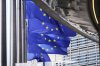 European Union flags flap in the wind outside EU headquarters in Brussels, Thursday, Aug. 21, 2025. (AP Photo/Virginia Mayo)