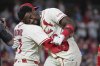St. Louis Cardinals' Jordan Walker, right, gets a hug from manager Oliver Marmol after Walker hit a walk-off two-run double to defeat the San Francisco Giants in the ninth inning of a baseball game Saturday, Sept. 6, 2025, in St. Louis. (AP Photo/Jeff Roberson)