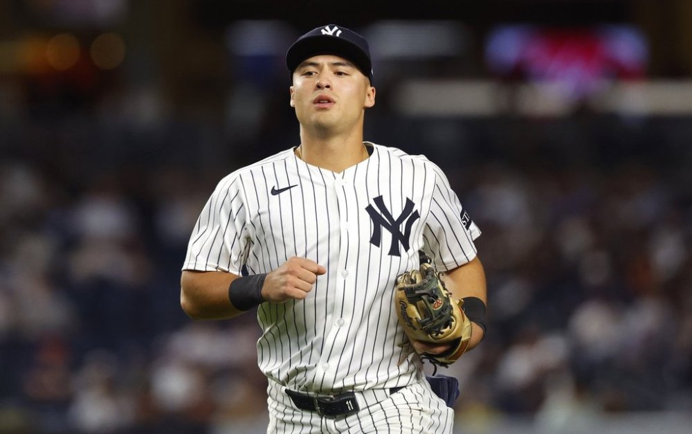 New York Yankees' Anthony Volpe goes to the dugout during the eighth inning of a baseball game, against the Washington Nationals, Tuesday, Aug. 26, 2025, in New York. (AP Photo/Noah K. Murray)