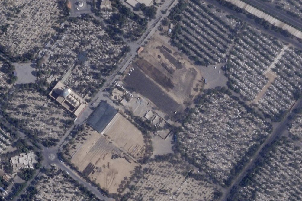 This satellite photo provided by Planet Labs PBC shows Iran paving over Lot 41, where some of those executed in the chaos after Iran's 1979 Islamic Revolution were buried, at Behesht-e Zahra cemetery outside of Tehran, Iran, Aug. 18, 2025. (Planet Labs PBC via AP)