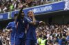 Chelsea's Joao Pedro, right, celebrates with teammates after scoring the opening goal during the English Premier League soccer match between Chelsea and Fulham at Stamford Bridge stadium in London, Saturday, Aug 30, 2025. (AP Photo/Ian Walton)