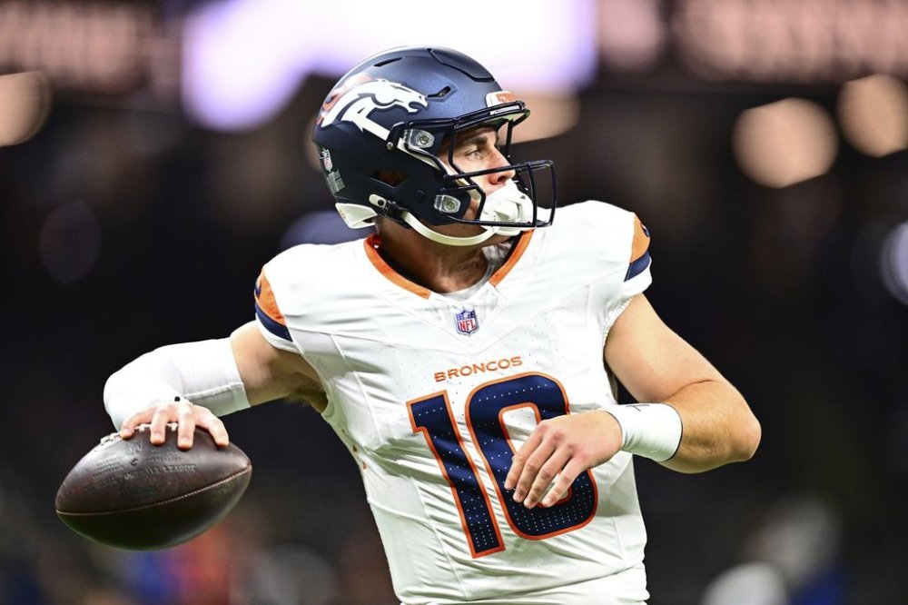 Denver Broncos quarterback Bo Nix warms up before facing the New Orleans Saints in an NFL preseason football game Saturday, Aug. 23, 2025, in New Orleans. (AP Photo/Ella Hall)