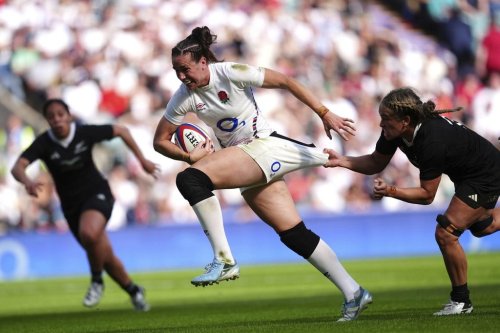 FILE - England's Emily Scarratt is tackled by New Zealand's Kennedy Tukuafu, right, during the Women's International match between England and New Zealand at Allianz Stadium, Twickenham, London, Saturday Sept. 14, 2024. (David Davies/PA via AP,File)