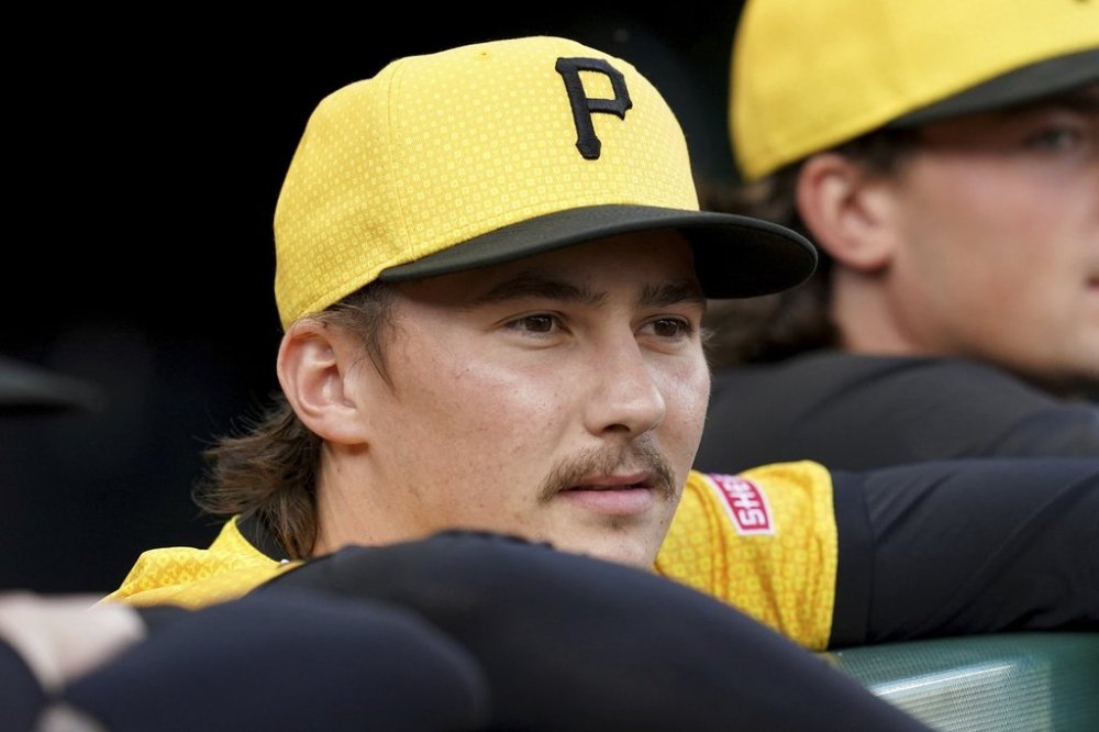 Pittsburgh Pirates pitcher Bubba Chandler stands in the dugout before a baseball game against the Colorado Rockies, Friday, Aug. 22, 2025, in Pittsburgh. (AP Photo/Matt Freed)