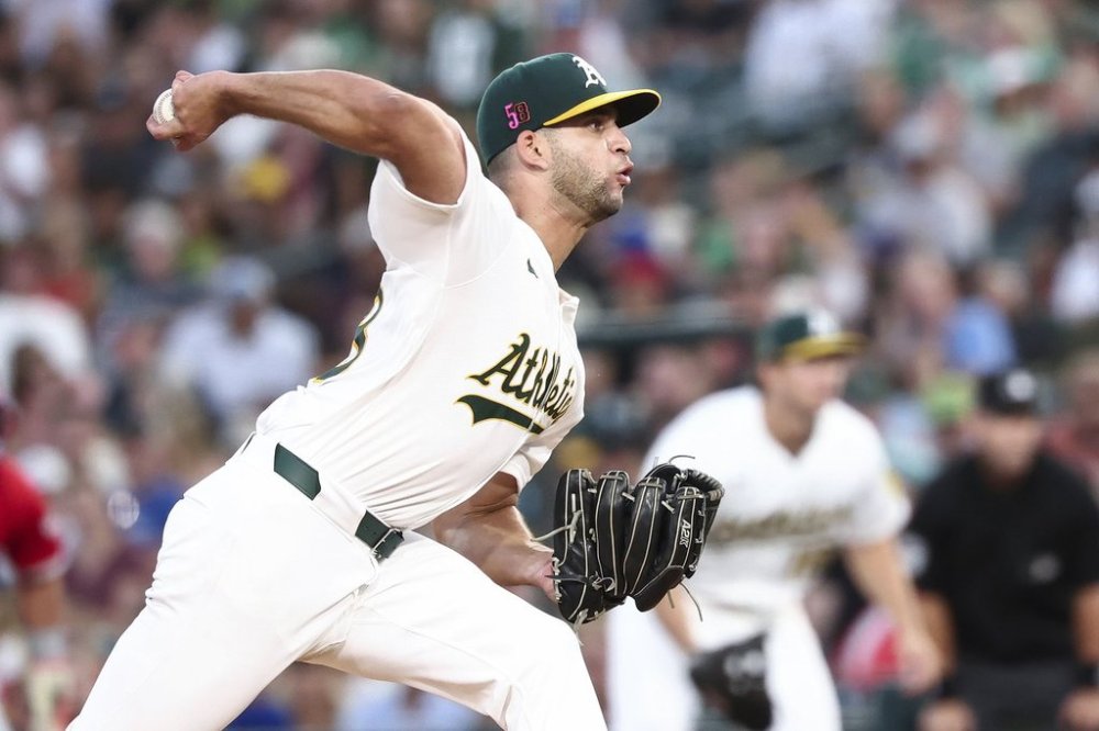 Athletics pitcher Luis Morales delivers to the Los Angeles Angels during the third inning of a baseball game Saturday, Aug. 16, 2025, in West Sacramento, Calif. (AP Photo/Sara Nevis)