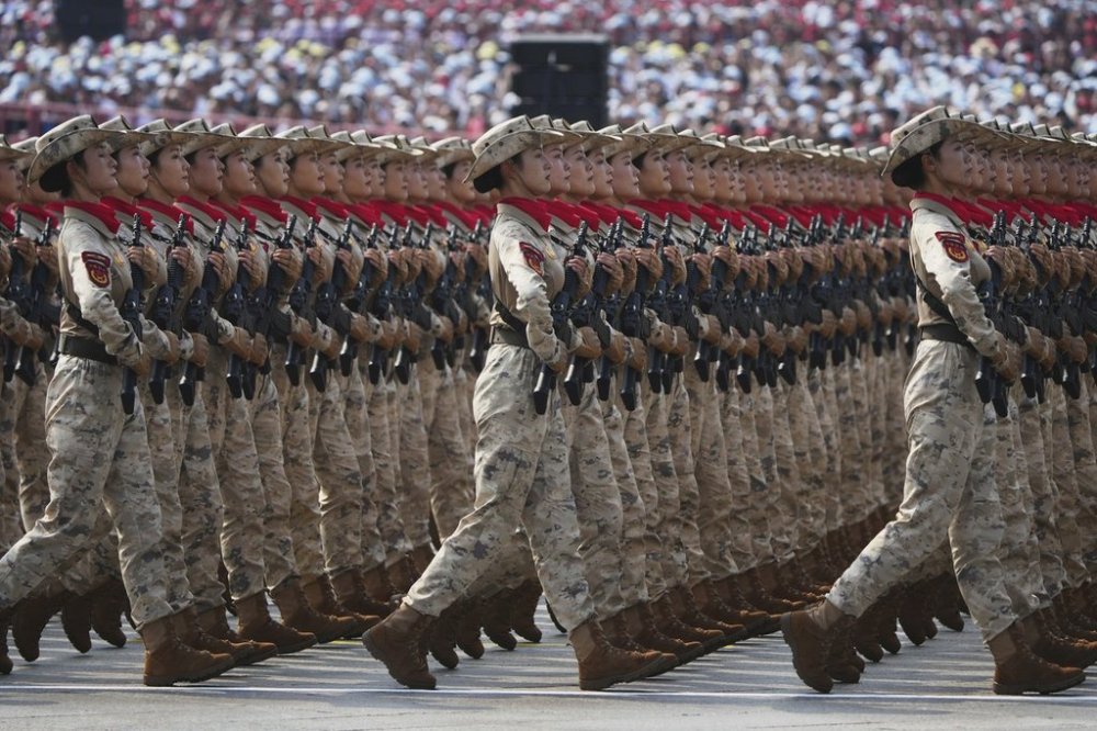 Military personnel take part in a military parade to commemorate the 80th anniversary of Japan's World War II surrender held in front of Tiananmen Gate in Beijing, Wednesday, Sept. 3, 2025. (AP Photo/Andy Wong)