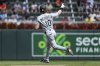Chicago White Sox's Chase Meidroth celebrates after his two-run home run as he runs the bases during the second inning of a baseball game against the Minnesota Twins, Monday, Sept. 1, 2025, in Minneapolis. (AP Photo/Matt Krohn)