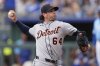Detroit Tigers relief pitcher Kyle Finnegan throws during the eighth inning of a baseball game against the Kansas City Royals, Sunday, Aug. 31, 2025, in Kansas City, Mo. (AP Photo/Charlie Riedel)