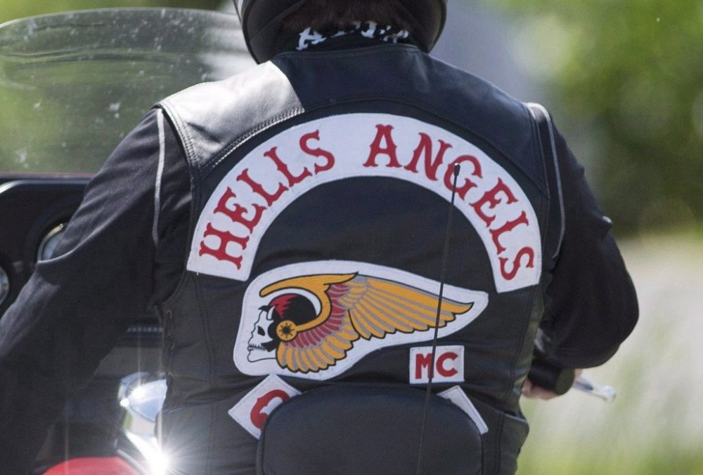 A member of the Hells Angels arrives for a national gathering in St-Charles-sur-Richelieu, Que., on Aug. 10, 2018. THE CANADIAN PRESS/Graham Hughes