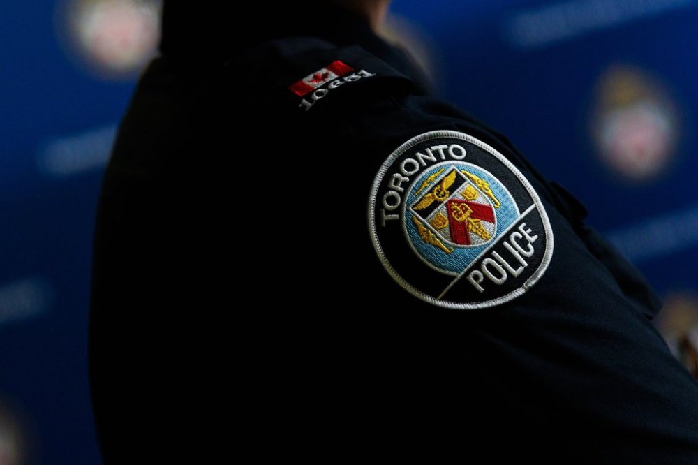 Toronto Police say they found a woman with injuries in a vehicle and was transported to the hospital, where she was pronounced dead. A Toronto police officer's uniform is seen during a press conference announcing the seizure of 835 kilograms of cocaine by the Toronto Police Service, in Toronto on Tuesday, Jan. 21, 2025. THE CANADIAN PRESS/Cole Burston