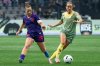 Calgary Wild's Meggie Dougherty Howard and Vancouver Rise's Nicole Stanton vie for the ball during the first half of an NSL match in Vancouver on Wednesday, April 16, 2025. THE CANADIAN PRESS/Ethan Cairns