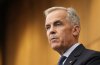 Prime Minister Mark Carney speaks with media during a news conference in Ottawa, Wednesday, July 30, 2025. THE CANADIAN PRESS/Adrian Wyld