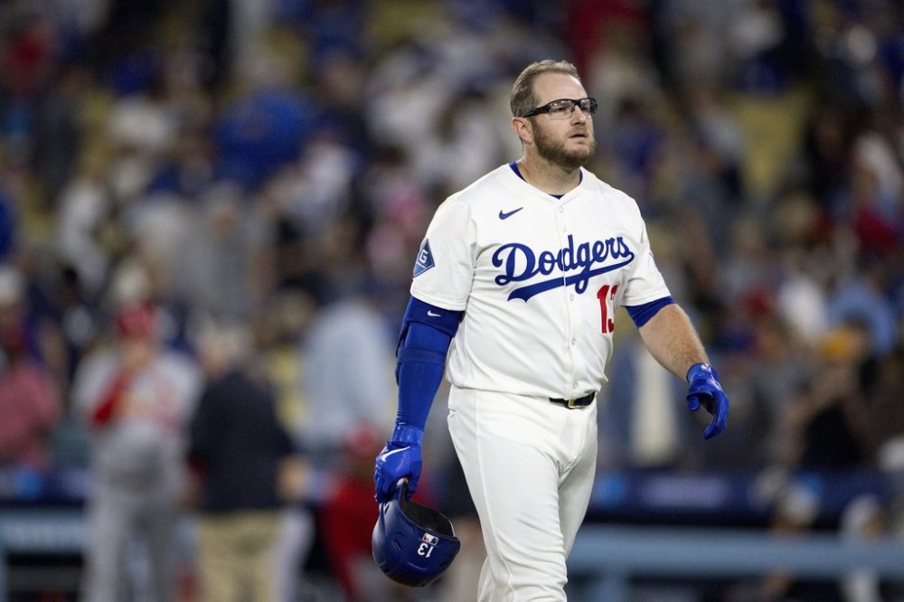 Los Angeles Dodgers' Max Muncy walks off the field after the ninth inning of a baseball game against the St. Louis Cardinals Monday, Aug. 4, 2025, in Los Angeles, Calif. (AP Photo/Eric Thayer)