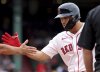 Boston Red Sox's Carlos Narváez os congratulated after hitting a two-RBI single during the fifth inning of a baseball game against the Cleveland Guardians, Monday, Sept. 1, 2025, in Boston. (AP Photo/Mark Stockwell)