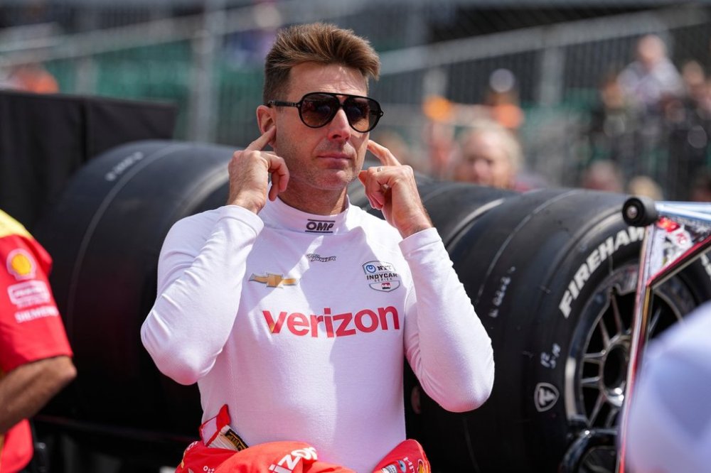 FILE - Will Power, of Australia, watches as he waits for is turn during qualification for the Indianapolis 500 auto race at Indianapolis Motor Speedway in Indianapolis, May 17, 2025. (AP Photo/Michael Conroy, File)