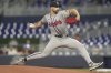Atlanta Braves starting pitcher Spencer Strider aims a pitch during the first inning of a baseball game against the Miami Marlins, Monday, Aug. 25, 2025, in Miami. (AP Photo/Marta Lavandier)