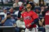 Atlanta Braves' Ozzie Albies celebrates after hitting a home run during the fourth inning of a baseball game against the New York Mets, Thursday, Aug. 14, 2025, in New York. (AP Photo/Yuki Iwamura)