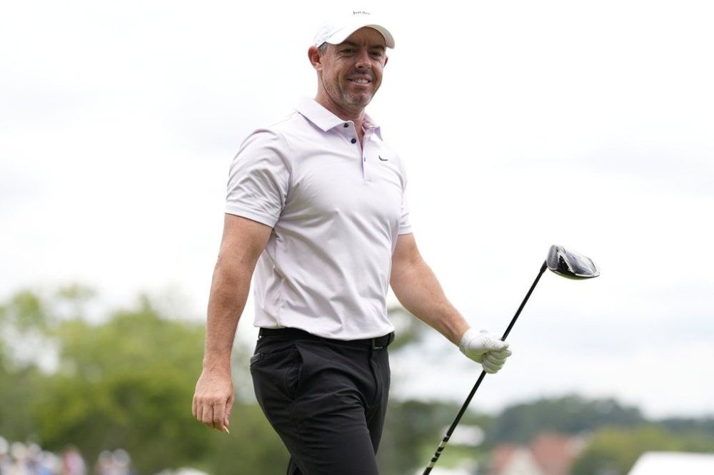 Rory McIlroy, of Northern Ireland, walks off the third tee during the final round of the Tour Championship golf tournament, Sunday, Aug. 24, 2025, in Atlanta. (AP Photo/Mike Stewart)