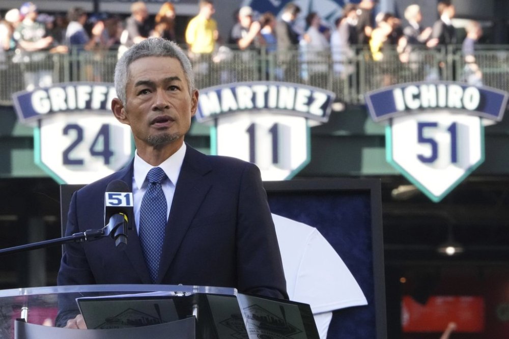 Former Seattle Mariners right fielder Ichiro Suzuki speaks during his jersey retirement ceremony on Saturday, Aug. 9, 2025, before a baseball game between the Mariners and the Tampa Bay Rays in Seattle. (AP Photo/Lindsey Wasson)