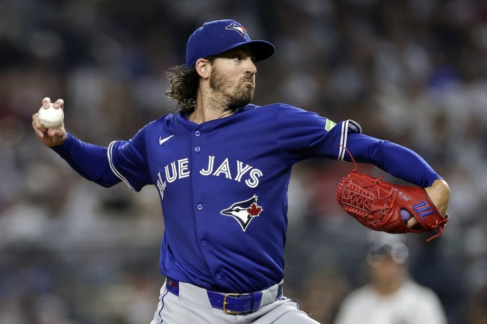 Toronto Blue Jays pitcher Kevin Gausman throws during the fourth inning of a baseball game against the New York Yankees, Friday, Sept. 5, 2025, in New York. (AP Photo/Adam Hunger)
