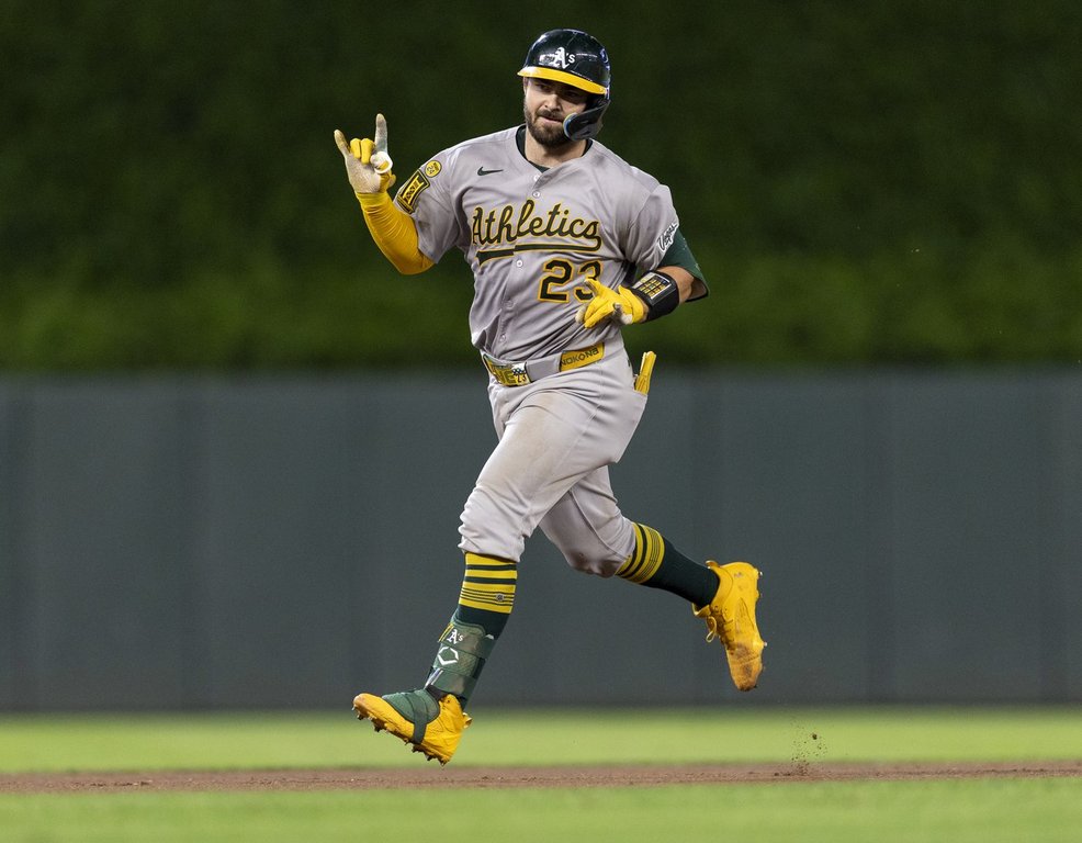 Athletics catcher Shea Langeliers (23) celebrates as he rounds the bases after hitting a two-run home run in the 10th inning of a baseball game in Minneapolis, Minn., on Wednesday, Aug. 20, 2025. (Carlos Gonzalez/Star Tribune via AP)