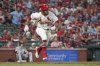St. Louis Cardinals' Brendan Donovan rounds first on a two-run double during the eighth inning of a baseball game against the Colorado Rockies Monday, Aug. 11, 2025, in St. Louis. (AP Photo/Jeff Roberson)