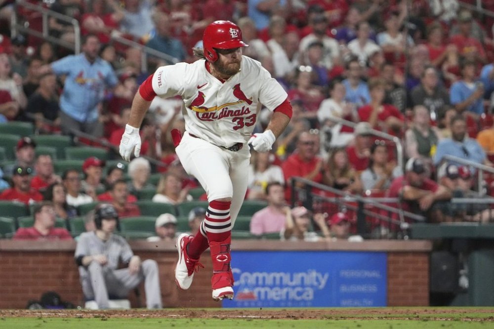 St. Louis Cardinals' Brendan Donovan rounds first on a two-run double during the eighth inning of a baseball game against the Colorado Rockies Monday, Aug. 11, 2025, in St. Louis. (AP Photo/Jeff Roberson)