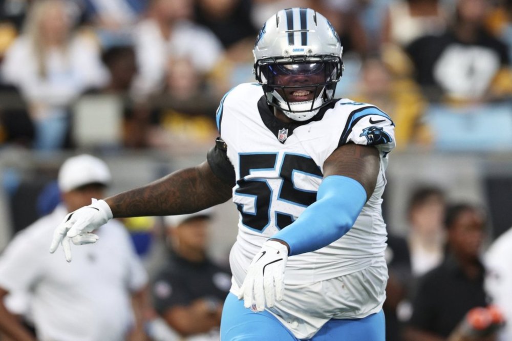 Carolina Panthers defensive tackle Cam Jackson celebrates after a tackle against the Pittsburgh Steelers during the first half of an NFL preseason football game, Thursday, Aug. 21, 2025, in Charlotte, N.C. (AP Photo/Scott Kinser)