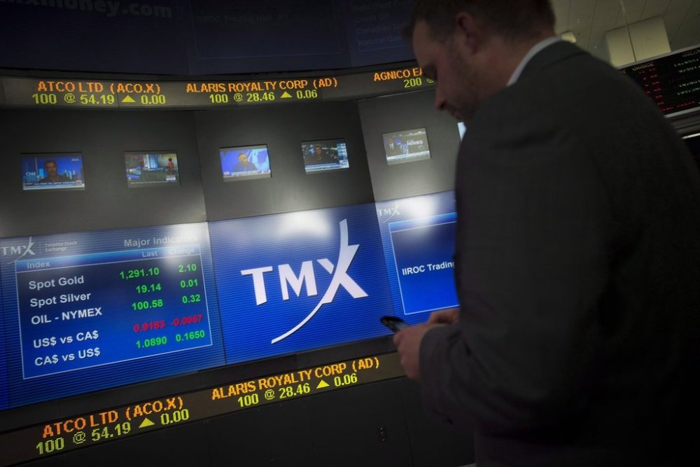 Kris Backus, TMX broadcast manager, works in the broadcast centre at the TMX Group Ltd. in Toronto, Ont.'s financial district on Friday, May 9, 2014. THE CANADIAN PRESS/Darren Calabrese