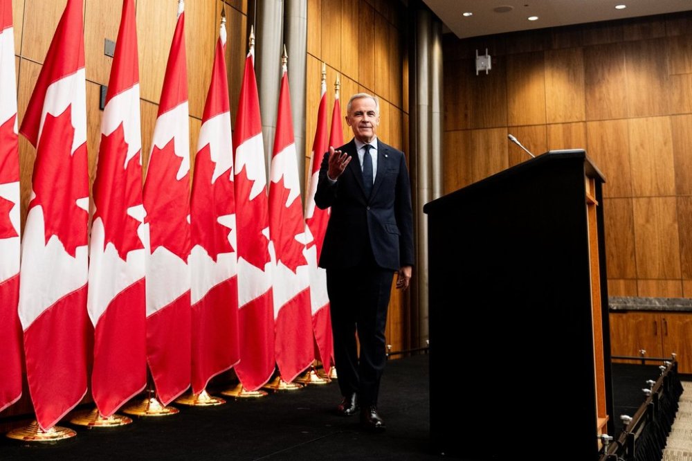 Prime Minister Mark Carney arrives for a press conference at the National Press Theatre in Ottawa, on Friday, Aug. 22, 2025. THE CANADIAN PRESS/Spencer Colby