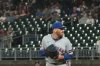 New York Mets pitcher Reed Garrett (75) delivers in the ninth inning of a baseball game against the Atlanta Braves, Friday, Aug. 22, 2025, in Atlanta. (AP Photo/Brynn Anderson)
