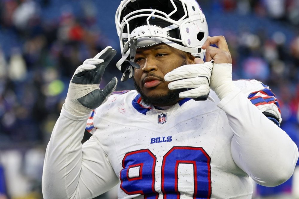 FILE - Buffalo Bills defensive tackle DeWayne Carter (90) reacts after being defeated 23-16 by the New England Patriots in an NFL football game, Sunday, Jan. 5, 2025, in Foxborough, Mass. (AP Photo/Greg M. Cooper,File)