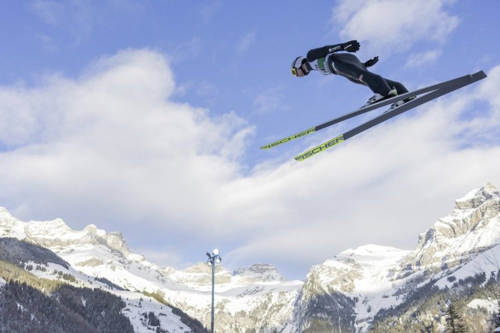 FILE - Kristoffer Eriksen Sundal from Norway at the men's Ski Jumping World Cup event at the Gross-Titlis Schanze, in Engelberg, Switzerland, Saturday, Dec. 21, 2024. (Philipp Schmidli/Keystone via AP, File)