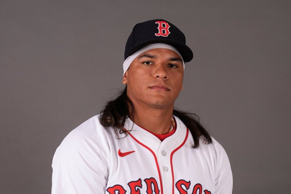 FILE - Boston Red Sox outfielder Jhostynxon Garcia poses during photo day at the team's training facility during baseball spring training in Fort Myers, Fla., Feb. 18, 2025. (AP Photo/Gerald Herbert, File)