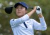 Aphrodite Deng of Canada watches her tee shot on the 11th hole in the first round of the Canadian Women's Open at Mississauga Golf and Country Club in Mississauga, Ont., on Thursday, Aug. 21, 2025. THE CANADIAN PRESS/Frank Gunn